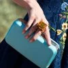 On The Rocks Clutch - Swiss Blue -Feminine Style Shop retouched pool blue rocks bag